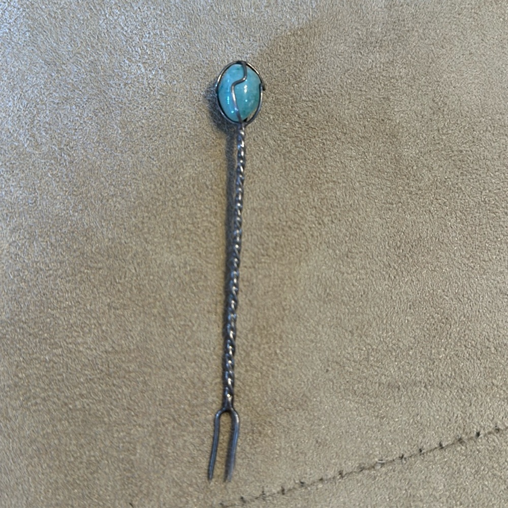 Silver vintage olive fork with stone